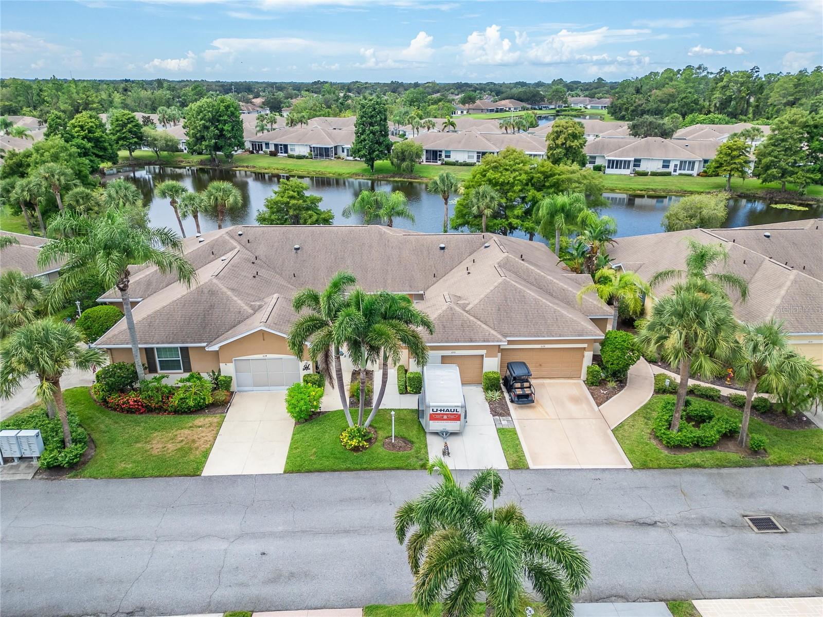This well-maintained, turn-key property offers a perfect blend of comfort, convenience, and low-maintenance living—ideal for full-time residents or snowbirds alike. Step inside to find a bright, open floor plan with spacious living areas and a kitchen designed for easy living and entertaining. The home features a generously sized primary suite, ample closet space, and tasteful finishes throughout. The oversized 1.5-car garage provides plenty of room for your car, golf cart, and additional storage. Whether you’re a hobbyist or just need extra space for seasonal items, this garage delivers! Relax on your private screened lanai and enjoy the beautifully landscaped surroundings overlooking the pond in peace and privacy. Kings Point offers resort-style amenities, including indoor/outdoor pools, golf, fitness centers, tennis, pickleball, and hundreds of social clubs and activities. All conveniently located near shopping, dining, medical centers, and just a short drive to the Gulf beaches and Tampa attractions.