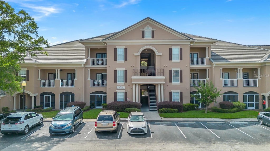 Photo of 14226 Fredricksburg Drive #220, Orlando, FL 32837 (MLS # O6438009)