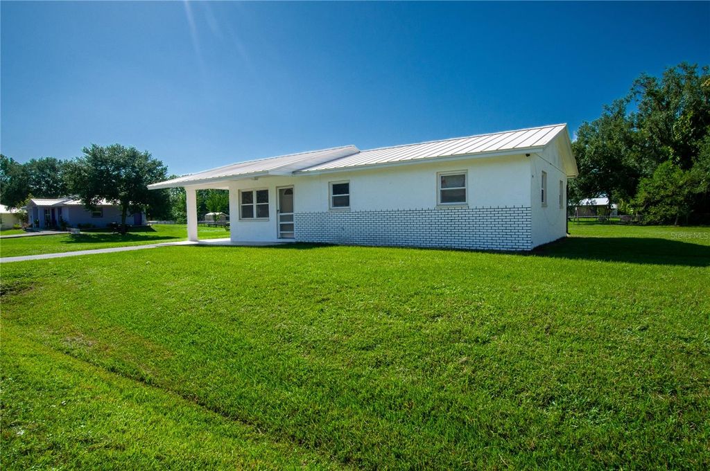 Photo of 1449 SE Peach Drive, Arcadia, FL 34266 (MLS # C7514808)