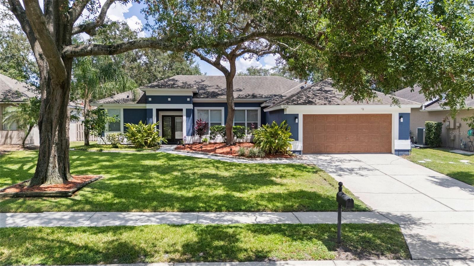 One or more photo(s) has been virtually staged. This beautifully landscaped and well maintained 3-bedroom, 2-bath home offers the perfect blend of comfort and convenience. Boasting 1,884 sq. ft. of living space, this residence features an open split floorplan with tile flooring throughout for easy care and timeless style. The kitchen is the heart of the home, showcasing granite countertops, ample cabinetry, and a functional layout that flows seamlessly into the living and dining areas. Step outside to enjoy your fully fenced in backyard and relax on the screened-in back porch, perfect for year-round Florida living. This home has been upgraded with new plumbing (2023) and a water heater (2023). Located in the sought-after Reflections community, residents enjoy access to fantastic amenities, including a community pool, basketball courts, and a playground. This home combines modern upgrades with a welcoming neighborhood feel—schedule your showing today! AC (2020) and roof (2015).