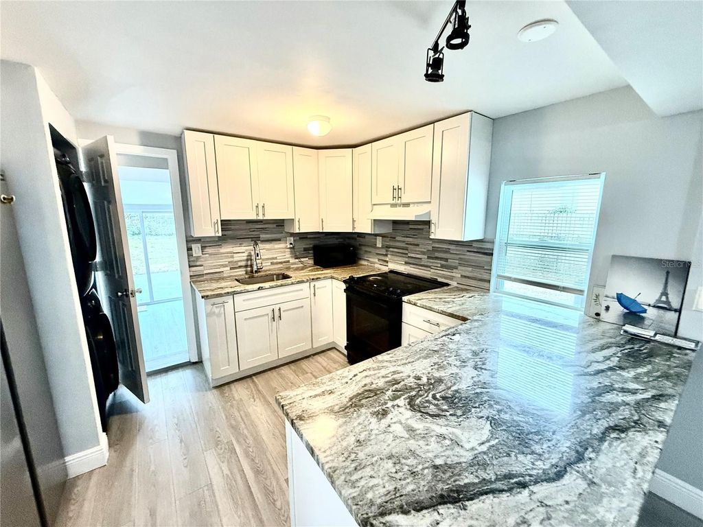 Photo of 1117 Lehto Lane, Lake Worth, FL 33461 (MLS # GC536601)