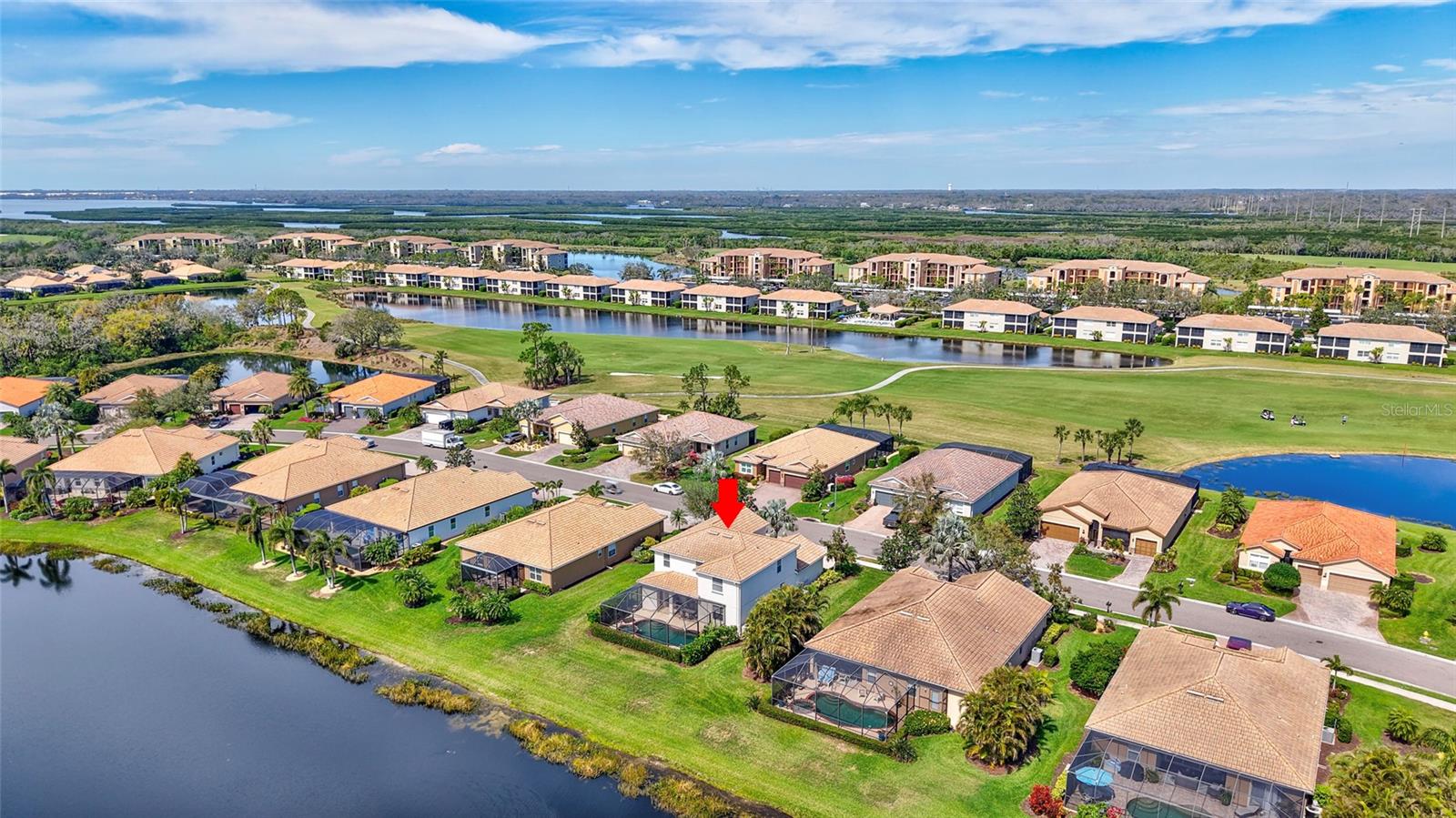 Great 2-story family home in River Strand Golf & Country Club, a rare opportunity to find this Navona floor plan home with amazing lake views. This 4 bedroom 3 and half bath plus EXTRA BONUS room comes with FULL GOLF AND SOCIAL MEMBERSHIP. FULLY FURNISHED and EQUIPPED. NEW pool heater, new pool pump, newer interior and exterior painting, flooring and furniture downstairs. MASTER Bedroom on the MAIN floor has 2 walk-in closets, his & her sinks. This solid house (any damages from hurricanes) has a large kitchen and upgraded hardwood cabinets with stainless steel appliances and granite countertops. Sliding glass doors leading to screened & spacious lanai area with HEATED POOL/SPA. With pool you will find a half bath. Three additional bedrooms plus bonus room are on the 2nd floor. River Strand is a private gated community with 24/7 security. The 27-hole championship golf course was designed by Arthur Hills, featuring spectacular views of the Manatee River and panoramic greens and fairways. The club also offers two clubhouses, nine lit, Har-Tru tennis courts with on-site Tennis pro shop; Pickle Ball, 2 main and 6 community pools, two modern fitness centers. A beautiful 39,000 sq. ft. Tuscan-inspired main clubhouse offering casual and fine dining, a bar and grill room, billiard room, card room, conference room, golf pro shop, resort style pool with "sand" beach and tiki bar. River Strand has magnificently landscaped grounds with running and biking trails. The home is perfectly located 3 minutes from Market Place at Heritage Harbour with COSTCO and in early future with Target and a lot restaurants and stores, 5 minutes of I-75, just 15-20 minute drive to Florida's most renowned, awesome sand beaches like Anna Maria Island, Siesta Key Beach, Lido Beach or Longboat Key with an awesome little beach restaurants and tiki bars. 15 minutes from large Ellenton Outlets Mall with all famous international brands, 15 minutes UTC Mall, 20 minutes from beautiful downtown of Sarasota. Sarasota airport 20 minutes, Tampa airport 45 minutes. Enjoy the warm and sunny beaches of the Florida Gulf Coast, and Sarasota too! Welcome Home, you will LOVE it here!