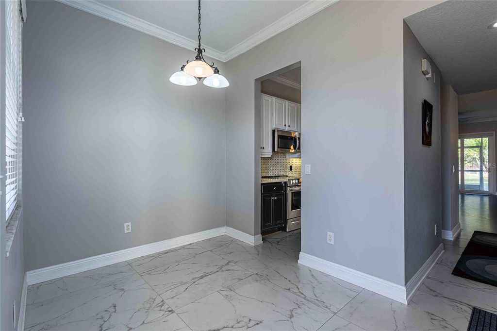 Photo of 21011 Picasso Ct #I-103, Land O Lakes, FL 34637 (MLS # TB8469804)