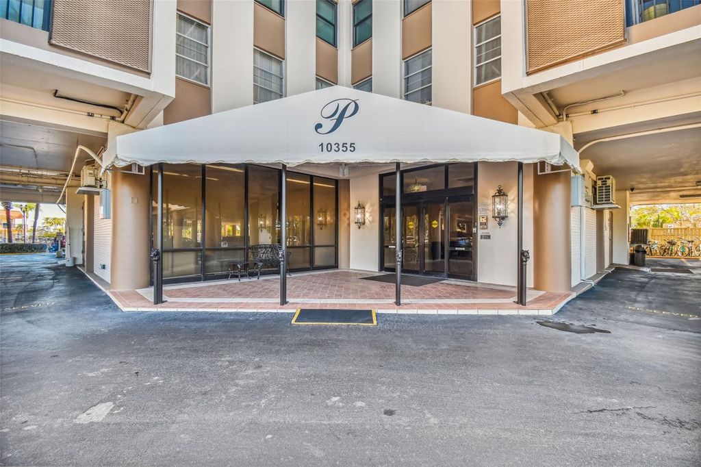 Photo of 10355 Paradise Boulevard #614, Treasure Island, FL 33706 (MLS # TB8476964)