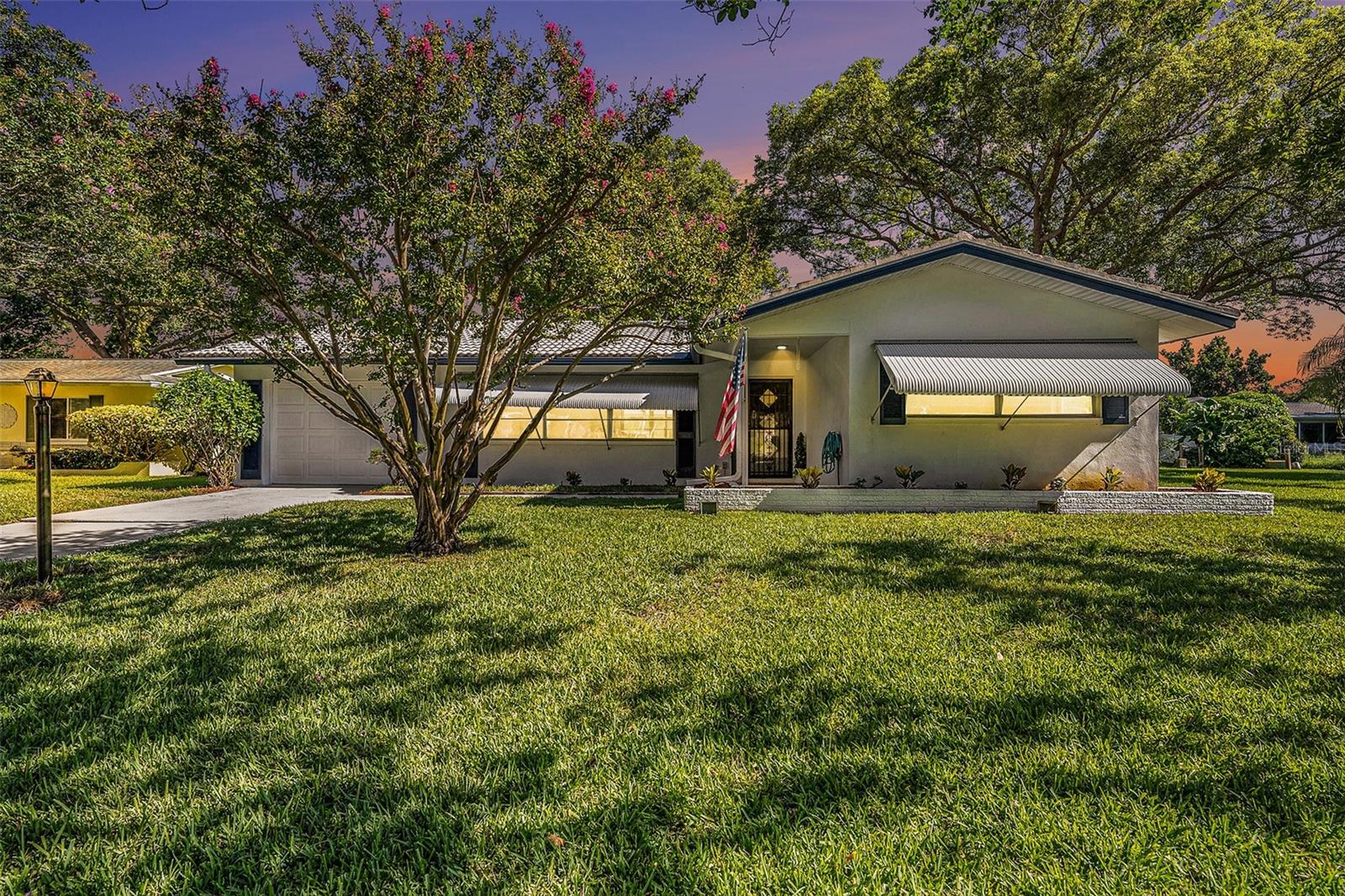 Perfect for FIRST TIME HOME BUYERS, this move-in ready single-family home in Clearwater is now available! Beautifully refreshed, this 2-bedroom, 2-bathroom residence is a true gem, perfect for buyers seeking a turnkey property in a well known family neighborhood.
Step inside and be captivated by a home with a light-filled interior featuring stunning terrazzo floors throughout, creating a seamless flow from the welcoming living room to the completely refurbished kitchen. The bathrooms feature new vanities and finishes. Fresh interior paint from 2025 provides a clean and bright living space. Two large living areas, one of which could be made into a third bedroom easily, making it a 3 bedroom 2 bath home, with a passing 4-Point inspection for your peace of mind, it's quite a gem.
The exterior is just as charming. A newly painted driveway and a meticulously landscaped yard (with a sprinkler system), both completed in 2025, provide exceptional curb appeal. The spacious, shaded backyard sits on a large lot over 10,000 square feet and offers a lovely and peaceful pond side-yard view, perfect for outdoor entertaining or simply relaxing or grilling. A new HVAC system (Dec 2024) and a new water heater (2024) have been installed for your peace of mind. A convenient one-car garage provides ample space for all your needs.
This home is situated in a quiet neighborhood with an optional HOA. Just minutes away from downtown Dunedin, where you’ll find a variety of amazing restaurants, shops, and local attractions, a dog friendly neighborhood, you will be able to enjoy many outdoor festivals and events, a marina for the perfect sunsets, unique local retail shops, breweries and coffee shops galore. In addition, you’re within a short drive of Countryside Mall, Whole Foods, major grocery stores, hospitals, Tampa Int'l and beautiful beaches. This is the perfect opportunity to enjoy a move-in ready home in one of the most desirable areas in Pinellas County. Schedule a showing today and make this lovely Clearwater home your own!
This home is a must-see! Don't miss the opportunity to own a well maintained property in a fantastic location.