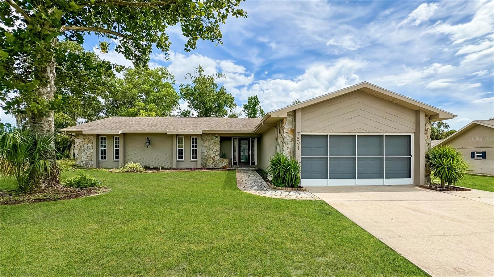 Seller motivated just REDUCED! A Must see to appreciate this UPDATED home in Weeki Wachee FL, where comfort meets elegance in this spacious 3-bedroom, 2-bath home. With 2,020 square feet of living space this property is designed for both relaxation and entertainment. Upon entering you are greeted by a bright and inviting layout that highlights the home's FRESH PAINT and modern UPDATES throughout. The expansive family room boasts HIGH CEILINGS and features a charming stone fireplace providing a cozy focal point for family gatherings. Large windows allow abundant natural light to flood the space enhancing the overall ambiance. The kitchen is a true highlight of this home featuring sleek GRANITE countertops and ample cabinet space ideal for culinary endeavors and family meals. Adjacent to the kitchen the FLEX ROOM serves as a versatile office space accommodating your work-from-home needs or could easily be transformed into playroom or hobby area. Stepping outside you'll find a LARGE SUNROOM w/ updated paint & flooring adds to the home's appeal offering the perfect space for morning coffee or evening relaxation while enjoying the serene private outdoor views. Additional features include a convenient inside laundry room, a modern SOLAR water heater 2016, and a NEW A/C system 2025 to ensure year-round comfort, Roof 2015, & some newer windows 2017. Located within The Heather golfing community this home benefits from LOW HOA fees of 24 mo. providing access to some local amenities. Come explore what the Nature Coast offers such as Springs, Parks, Kayaking, Boating, nearby amenities & more. This property presents an exceptional opportunity for those seeking a move-in ready home in a desirable area. Schedule your viewing today to experience all that this home has to offer!
