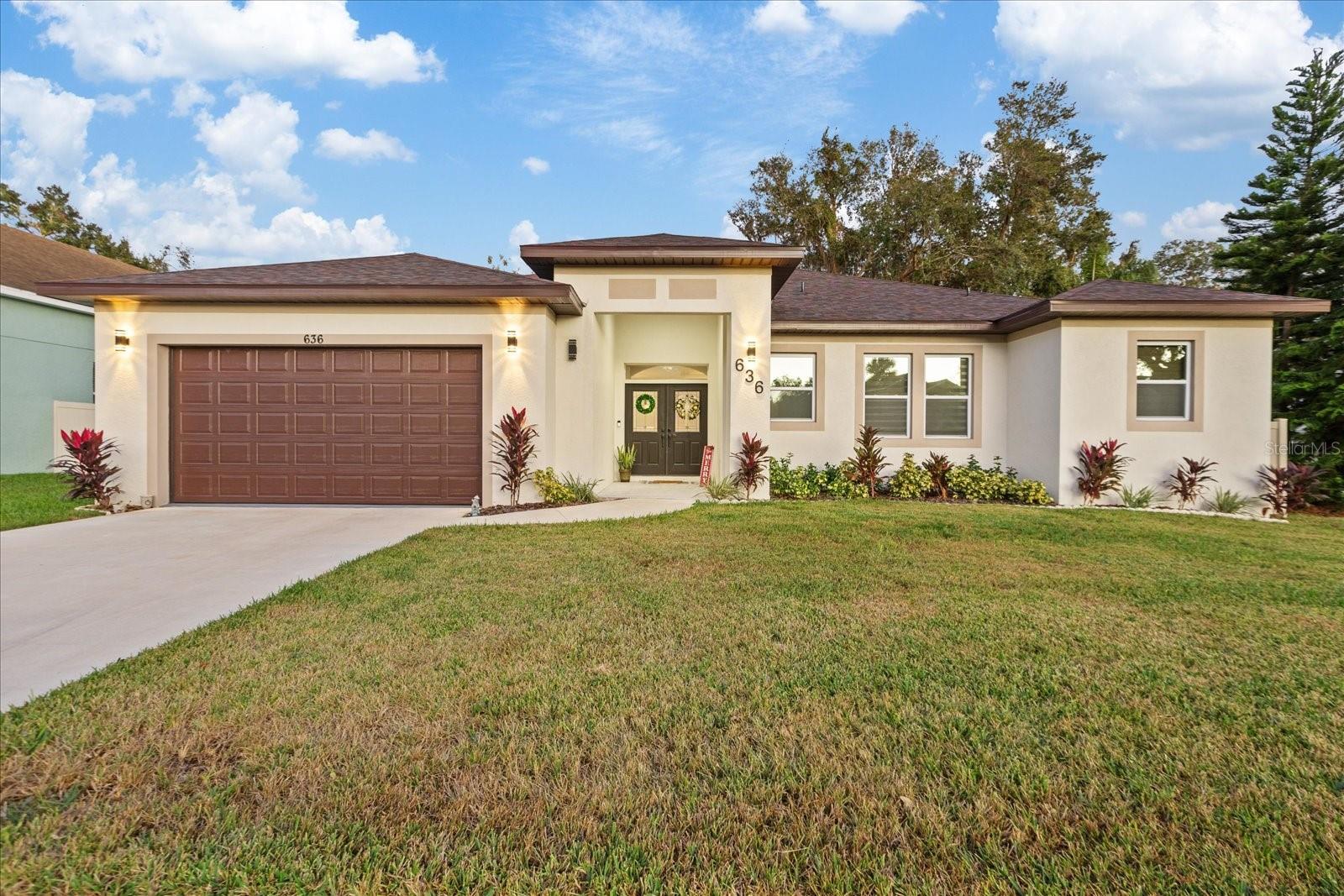 One or more photo(s) has been virtually staged. Beautiful new build in 2024 with 4 bedrooms 3 bathrooms with an oversize garage , the home features a beautiful 14 foot entrance with a double door, the second you come in there is a nice large foyer, a dream kitchen with a water fall on the island, all 42 inch wood cabinets with a nice cooktop with a 36 inch range hood and a double oven ,beautiful marble counter top with full backsplash. all 8 foot doors for all bedrooms, all stand showers in bathroom and a stunning dream bathroom in the master bedroom with a large shower along with gold trim all through out and a beautiful standalone tub, a double tray ceiling in master bedroom and Livingroom, once you step in the back porch it features a very large covered porch for your get together.