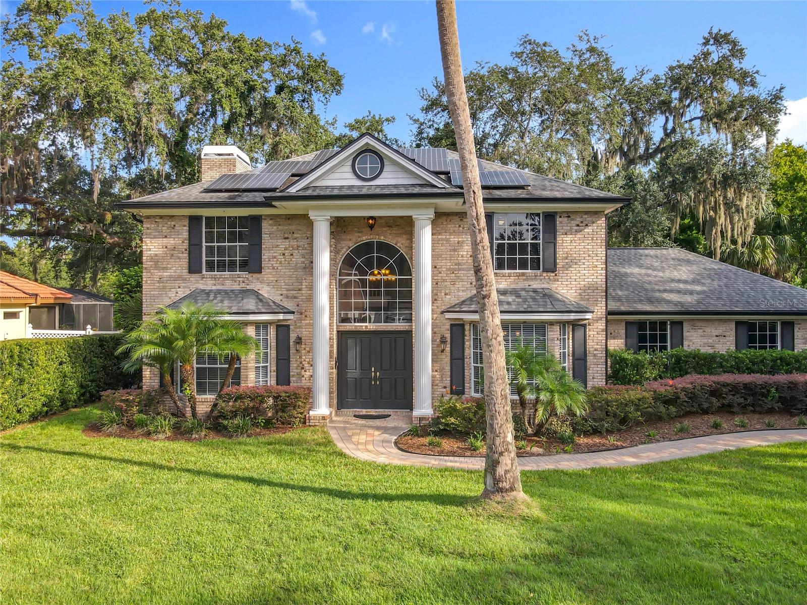 Welcome to River Walk, Oviedo’s premier GATED community. This small enclave of about 120 homes features large lots, winding streets, established Live Oak trees and mature landscaping making the community warm and welcoming. This stunning property sits on an almost 1/2 ACRE, with a SIDE LOAD GARAGE and extended paved driveway.
This turn-key property has 4 bedrooms, 2 full baths and 1 half baths. This home has been entirely renovated and features 48" solid wood cabinets, gorgeous granite counters, wood like tile on main first floor and timeless solid hardwood flooring in main areas on second floor. Kitchen features stainless steel appliances, spacious serving area that is great for holiday buffets and opens to the breakfast area and family room which features updated fireplace, 10 ft ceilings throughout, French doors, and stunning views to the little econ conservation river. The Owner’s retreat is the perfect oasis that includes a wood burning fireplace, room for a sitting area and balcony overlooking to the pool & conservation area. Master retreat also features expansive walk-in closet, fully updated masters bathroom with dual vanity, garden tub, walk in shower and separate toilet room. The pool area features an enclosed sitting area and expansive covered covered lanai that has room for both a sitting and dining area making it the for family gathering and entertaining.
Zoned for “A” rated Seminole county schools and close to UCF, Research Park, major employers and SR 417. Don’t wait to see this unique property. NEW WATER SOFTENER 2025, WASHER & DRYER 2025, ROOF 2019, TIMELESS BRICK EXTERIOR, SCREENED POOL AREA, SOLAR PANELS 2019 and an electric bill that ranges from $30-$50. SOLAR PANELS ARE PAID OFF!