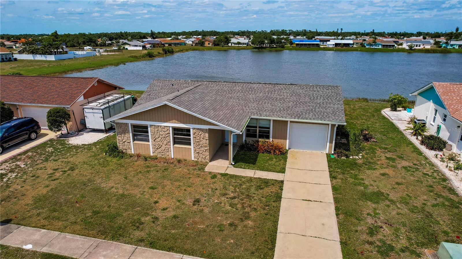 Move-In Ready Lakeview Home!
This 3-bedroom, 2-bath single-family home offers stunning lake views and peace of mind with its location outside flood zone areas. Nestled in a desirable community, you’ll enjoy resort-style amenities including a sparkling pool, clubhouse, fitness center, tennis courts, and a recreation area. Low HOA fees make it even more appealing. Conveniently located near shopping, dining, and less than 20 minutes to the beach, this home is ready for you to move in and start enjoying the Florida lifestyle.