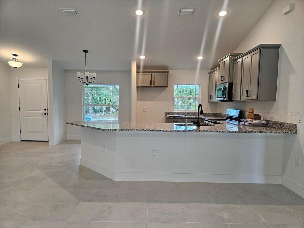 Photo of 7387 Petal Road, North Port, FL 34291 (MLS # A4659413)