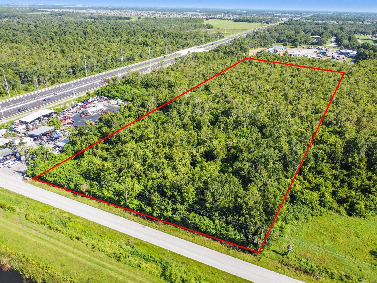 This 10± Acre land parcel is comprised of two adjacent 5± acre land parcels: 11632 Bill Tucker Rd #U-29-31-20-ZZZ-000003-19440.0 and adjacent land parcel 10502 Bill Tucker Rd (Parcel B) #U-29-31-20-ZZZ-000003-19430.0. One of last 10± Acre land sites in the area. Excellent visibility from drivers along 6-lane Highway US-301. Great location: only 3 miles south of Big Bend Rd (Sam's Club, multiple major shopping centers, etc), & only 2.5 miles north of US-674 Sun City Blvd (Walmart, etc). Easy Highway I-75 access just 4 miles away (Exit #246).
The opportunity is to purchase this 10± ACRES near corner of busy 6-lane Highway US-301 & Bill Tucker Rd, in Riverview / Wimauma, FL area. Wide 330-ft road frontage on Bill Tucker. Very visible to tens of thousands of drivers per day on US-301. 10± ACRES = 433,858 Sq.Ft.
Major retailers located in surrounding vicinity include: Walmart, Advance Auto, ALDI, AutoZone Auto Parts, AT&T, Bealls, Buffalo Wild Wings, Chick-fil-A, Crunch Fitness, Culver's, Dollar Tree, Dunkin' Donuts, Firestone Auto Care, Goodyear Auto Service, IHOP Restaurant, Longhorn Steakhouse, Marshalls, McDonalds, Moe's Southwest Grill, Panda Express, Panera Bread, Qdoba Mexican Eats, Sally Beauty Supply, Sam's Club, Sprouts Farmers Market, Taco Bell, Texas Roadhouse, Tractor Supply Co., Walgreens, Wendy's Winn-Dixie, Verizon, Valvoline Instant Oil Change, & many more!
This 10± ACRE site is surrounded by thousands of single-family homes & multifamily residences occupied by tens of thousands of residents / potential customers, placing a robust built-in customer base minutes from this 10± ACRE site. Over the past few years, 10,000+ residents have been added via several new residential housing developments nearby (Cypress Creek, Ayersworth, Valencia Del Sol, Belmont, South Fork, etc), making this one of the fastest-growing areas of Hillsborough County, Florida.