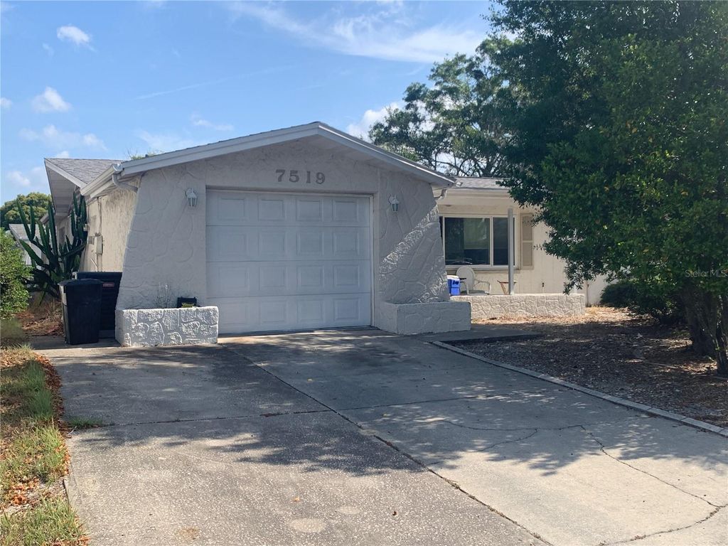 Photo of 7519 Kensico Drive, Port Richey, FL 34668 (MLS # TB8400080)