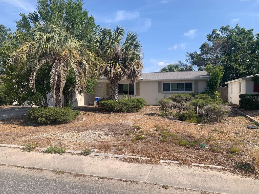 Photo of 7519 Kensico Drive, Port Richey, FL 34668 (MLS # TB8400080)