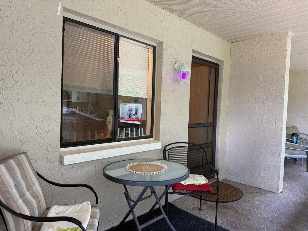 Photo of 20893 Haulover Cove #6, Lutz, FL 33558 (MLS # W7890333)
