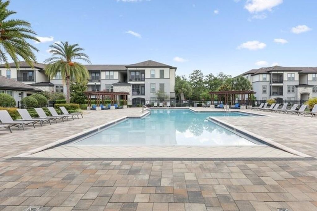 Photo of 11128 Grande Pines Circle #Oasis, Orlando, FL 32821 (MLS # O6403290)