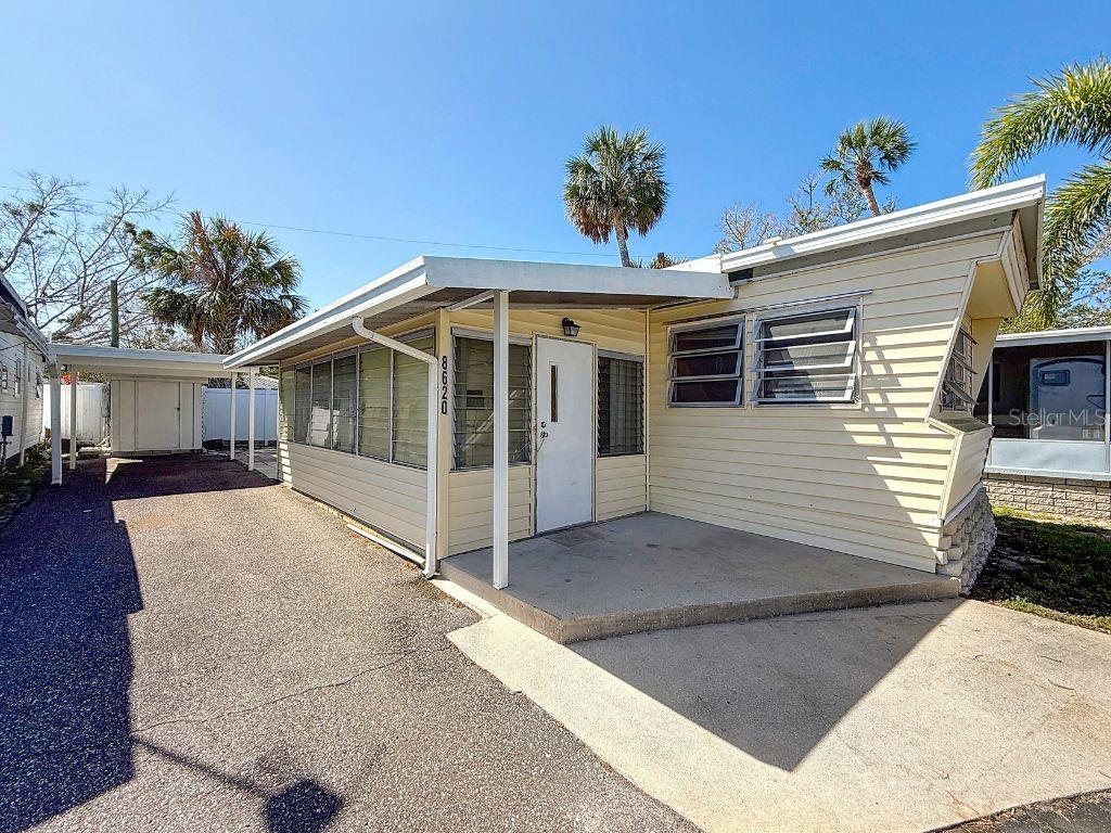 Welcome to Sea Horse Park, your DEEDED waterfront escape in the heart of St Petersburg. That's right - NO LOT RENT! You own the land in this community! The location of this community cannot be beat. Not only are you close to all of the shopping and dining in the Tyrone Square area of town, but you're just 10 minutes from the beach, 5 minutes to Bay Pines VA Hospital, and the community itself is waterfront, complete with boat ramp! This is being listed and sold as a tear down. If you choose to buy this home with the intention of renovating it, you are taking all risks and liabilities, as THIS IS BEING MARKETED AND SOLD AS A TEAR DOWN WITH NO GUARANTEE OF BEING ABLE TO REPAIR WITH FEMA 50% RULE. HOME AND ENTIRE PARK WERE FLOODED DURING HURRICANES. Lot lines and dimensions are approximate based off public records; buyer would need to get a survey done to verify lot size and setback restrictions. Do not rely on the setbacks of the current home. New home would need to be raised to current flood zone guidelines. Sea Horse Park is a 55+ amenity-rich community. Not only do they have the boat ramp, they have laundry facilities, shuffleboard, community pool, and a clubhouse! Please keep in mind that this is a no-pet park (ESA animals under 25 pounds are allowed) and this property is being sold CASH ONLY.