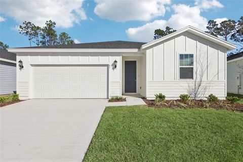 Photo of 51 Wandering Creek Way, Palm Coast, FL 32164 (MLS # O6350112)