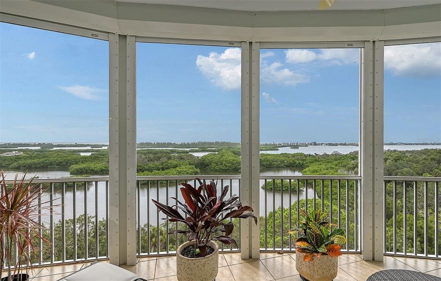 This opulent 3 bedroom plus den, 3 bath residence with a PRIVATE 2 CAR GARAGE located in Meridian at The Oaks Preserve, is a dream come true! A penthouse-level end unit situated on the north side of the building, it has been carefully updated and meticulously maintained. From the moment you step off your private elevator you will be impressed by this spacious unit. 10 foot ceilings, floor-to-ceiling windows and sliding doors flood the rooms with light and make the interior open and bright. The beauty of the interior is complimented by gorgeous water views from the screened balcony and from most of the rooms in the unit. With so many touches like wide plank flooring, tray ceilings, custom lighting fixtures, a large eat-in area in the open kitchen and a formal dining area, a big laundry room, as well as the previously mentioned 2 car garage with epoxy floor, you would be hard pressed to find a more perfect place to call home. The Meridian has a residents-only pool, spa and work out room. Located in the heart of south Sarasota, The Oaks offers 2 championship golf courses, a world-class tennis facility, a state-of-the art wellness center and a wide variety of club amenities, including dining options and social offerings. Club membership is required with homeownership.