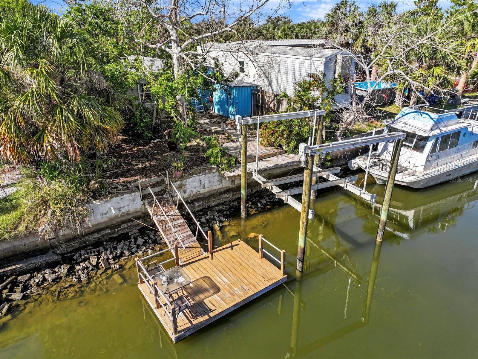 Direct Gulf Access - Investor Special! This Gulf Coast fishing retreat offers 42 feet of frontage on a saltwater canal with a concrete seawall, 10K boat Lift and Floating Dock with no fixed bridges, providing seamless access to the Gulf of Mexico. Spend your days watching dolphins and manatees swim by or cast your line right from your backyard to catch redfish, snook, and snapper.
The 1 bedroom and 1-bathroom mobile home was damaged during Hurricane Helene flooding. The owner had done their best to dry out the home. This property is a blank canvas, ready for you to bring your vision to life.
Being sold As-Is, Where-Is, and How-Is. The seller retains the right to any insurance or other payments related to the previous damage. Buyers are responsible for verifying all information and completing any necessary due diligence or inspections. No sight unseen offers will be considered. No assignability of contract to stop wholesalers.
Don’t miss this rare opportunity to own an affordable direct Gulf access home and create your dream coastal escape!