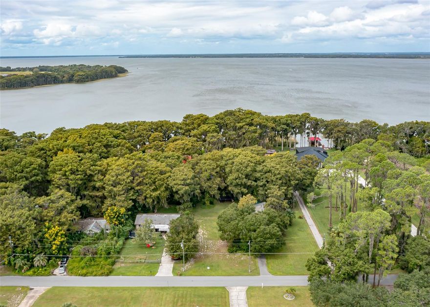 Discover this beautiful 0.36-acre buildable lot perfectly situated on a canal leading directly to Lake Harris, part of the renowned Harris Chain of Lakes. Enjoy boating, fishing, kayaking, and waterfront living right from your backyard. Whether you’re envisioning a custom home, a weekend retreat, or an investment property, this location offers endless potential. Tranquil surroundings with convenient access to shopping, dining, and major highways make this a rare opportunity to enjoy the best of Florida’s lakefront lifestyle. Bring your plans and make it your own!