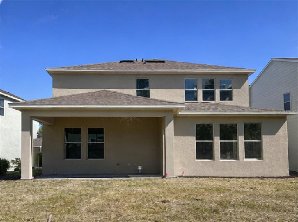 Photo of 18386 Oliver Twist Way, Winter Garden, FL 34787 (MLS # O6388830)