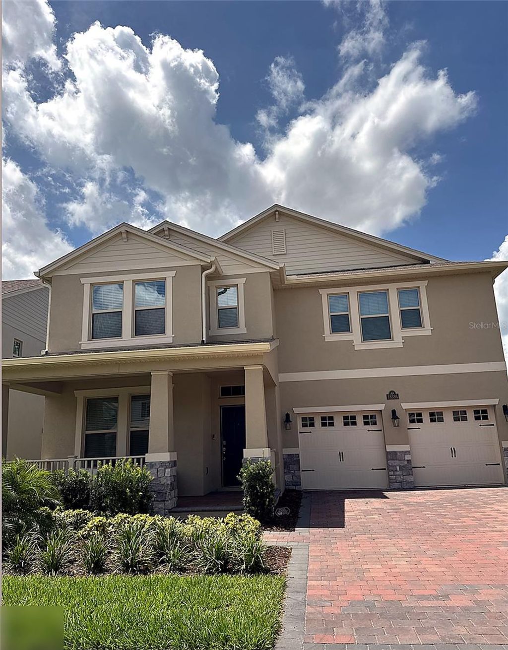 Photo of 18386 Oliver Twist Way, Winter Garden, FL 34787 (MLS # O6388830)