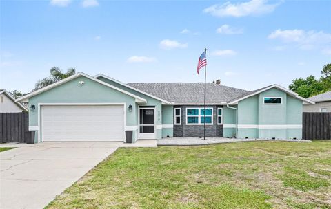 Photo of 5070 Curtis Boulevard, Cocoa, FL 32927 (MLS # O6402375)