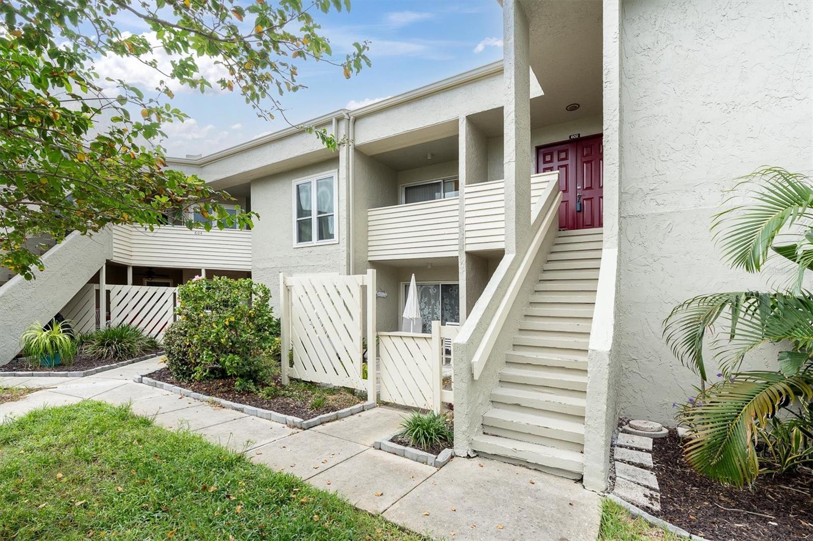 Welcome to your waterfront retreat in Tarpon Springs on the beautiful Gulf of Mexico! This fully furnished second-floor condo offers two spacious bedrooms and two full bathrooms, making it the ideal winter escape, year-round residence, or income-producing investment. With no flooding or hurricane damage during last storm season, you can enjoy peace of mind while embracing the coastal lifestyle.
The interior has been thoughtfully updated with a modern kitchen, laminate flooring throughout, and the convenience of an interior washer and dryer. The primary bedroom features a generous walk-in closet and private access to a separate Florida room, creating the perfect spot to relax with a morning coffee or unwind after a day at the beach. The open layout fills the space with natural light and breezes, blending comfort with easy living. This community is designed for leisure and connection, featuring a clubhouse with a fitness room, billiards table, TVs, a kitchen, and a sparkling community pool. Residents also enjoy a community pier and expansive green space, the perfect setting to take in the Gulf breezes, sunsets, and breathtaking waterfront views. Living here is about more than just the home—it’s about the lifestyle. Stroll along the Gulf, explore the historic sponge docks, or spend evenings at Sunset Beach, where free concerts bring the community together against the backdrop of unforgettable sunsets. Whether you’re looking for a seasonal getaway, a full-time residence, or a vacation rental, this condo captures the very best of Florida living