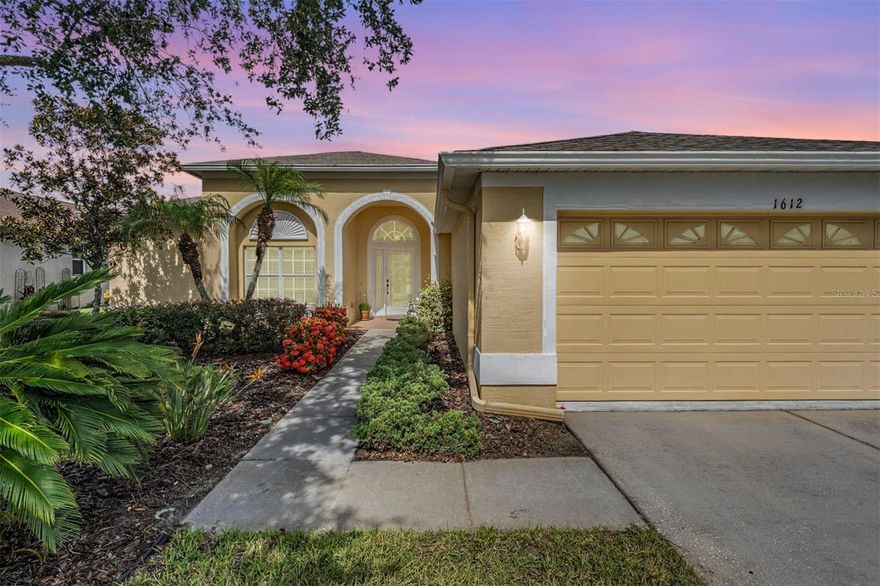 Welcome to Lakestone Drive - one of the most desirable streets that are extra wide with long driveways!   HVAC REPLACED 2021, BRAND NEW ROOF 8/2025.  This is a “traditional” style home, meaning a wider footprint, and a wider lot. TRUE 3 bedroom home with the ever so popular open floor plan and great news, no carpet. The entire home is a soothing neutral color palette and offers a seamless view of the lanai through its sliding glass doors. The heart of this home, the kitchen, impresses with extra counter and cabinet space, along with breakfast bar seating. The breakfast nook , featuring panoramic windows to enjoy slow mornings. Escape to the oversized primary suite. The thoughtful primary bathroom enhances relaxation with its open, step-in shower, linen closet, and double vanity providing additional storage options. The secondary bedrooms are versatile, ready to accommodate your unique lifestyle needs with ease. Outside, the screened-in porch beckons as the perfect spot to unwind, accessible from both the living room and primary bedroom, offering a seamless blend of indoor-outdoor living. With an extra long driveway for visitors, this home is located in a sought-after area of the neighborhood - come see why Lakestone is a great place to be! 55 & FUN - LIVE THE HERITAGE SPRINGS LIFESTYLE - Resort style living at its absolute finest! Clubhouse with restaurant and bar, fitness, tennis, golf, cards, billiards, dancing and more! SUPERB TRINITY LOCATION, CLOSE TO BEACHES, DINING, SHOPPING, MEDICAL AN