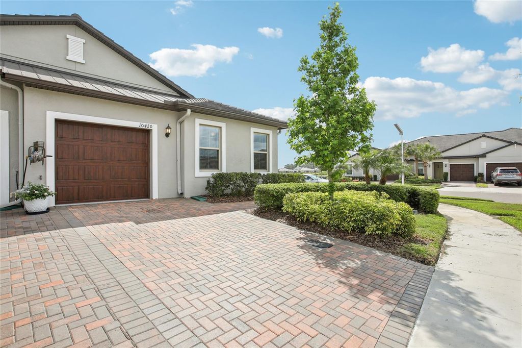 Photo of 10420 Echo Dock Loop, San Antonio, FL 33576 (MLS # TB8380547)