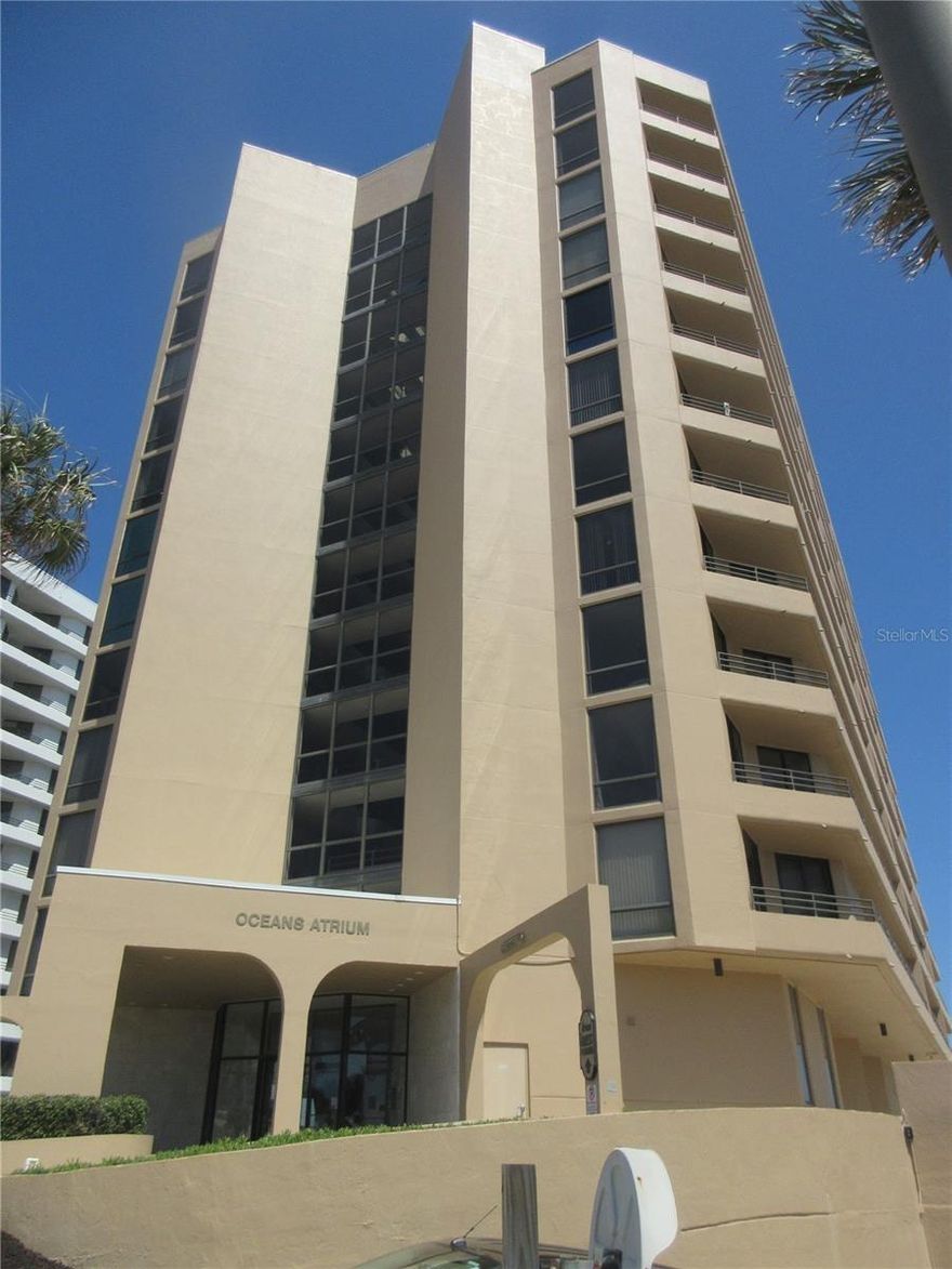 2nd Floor Condo Ready For Immediate Occupancy.  Beautifully Decorated With All You Need to Live in or Rent Out. Spectacular Views of the Beach Whether Looking at the Water, Watching The Parade Go By or Watching the Sunset.  4 New Sets of Sliding Glass Doors and Window Replaced 2021/2022, New Stainless Steel Appliances Replaced Jan 2025, Living Room Carpet Replaced March 2025, A/C Replaced Aug 2022, Water Heater Replaced Nov 2021.  The Building offers a Social Room for Private Parties or to Relax and Meet Others, a Library, Exercise Room, An Indoor and Outdoor Pool and an Indoor Spa and Sauna. Publix and Walgreens Across the Street. Close to Restaurants, Shopping, Churches and Medical Faciliities.