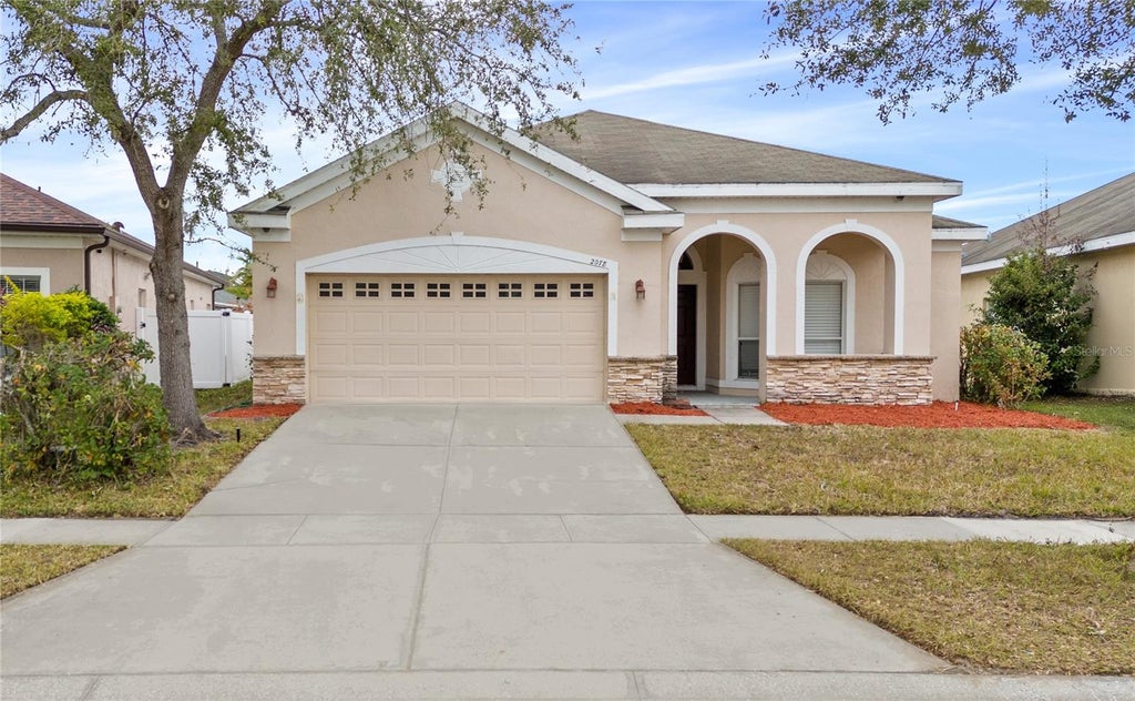 Photo of 2078 Marsh Hawk Drive, Orlando, FL 32837 (MLS # O6447607)