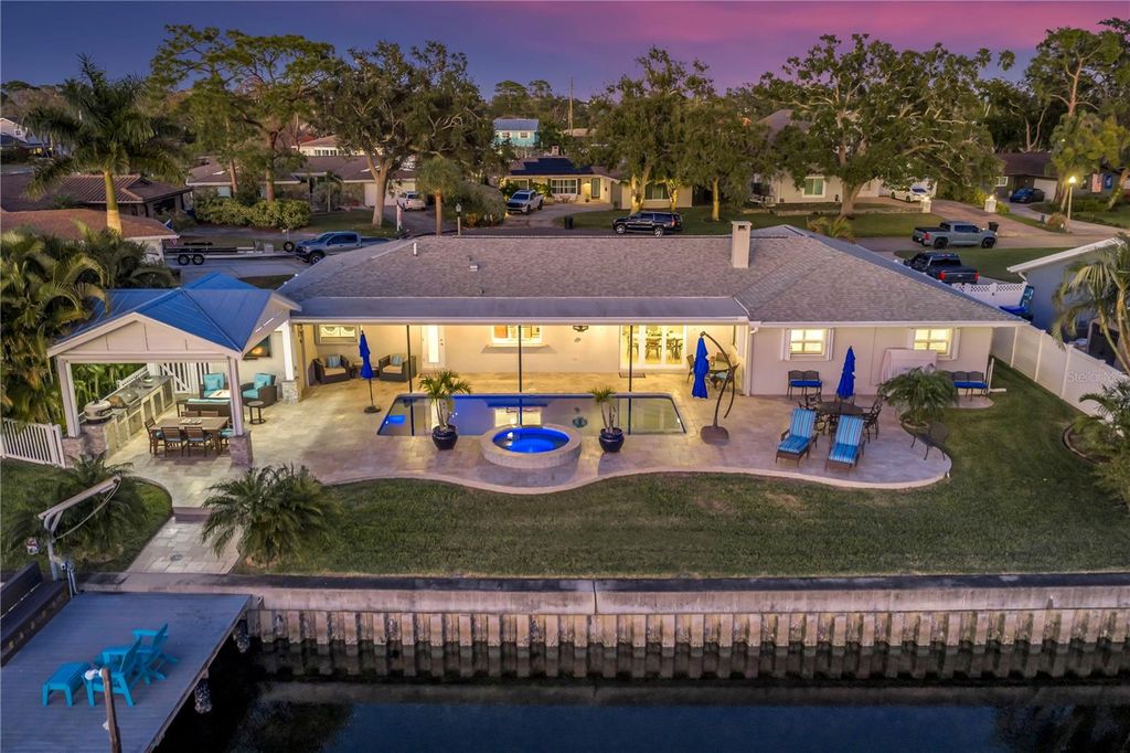 Photo of 5166 Horseshoe Place NE, St Petersburg, FL 33703 (MLS # TB8471710)