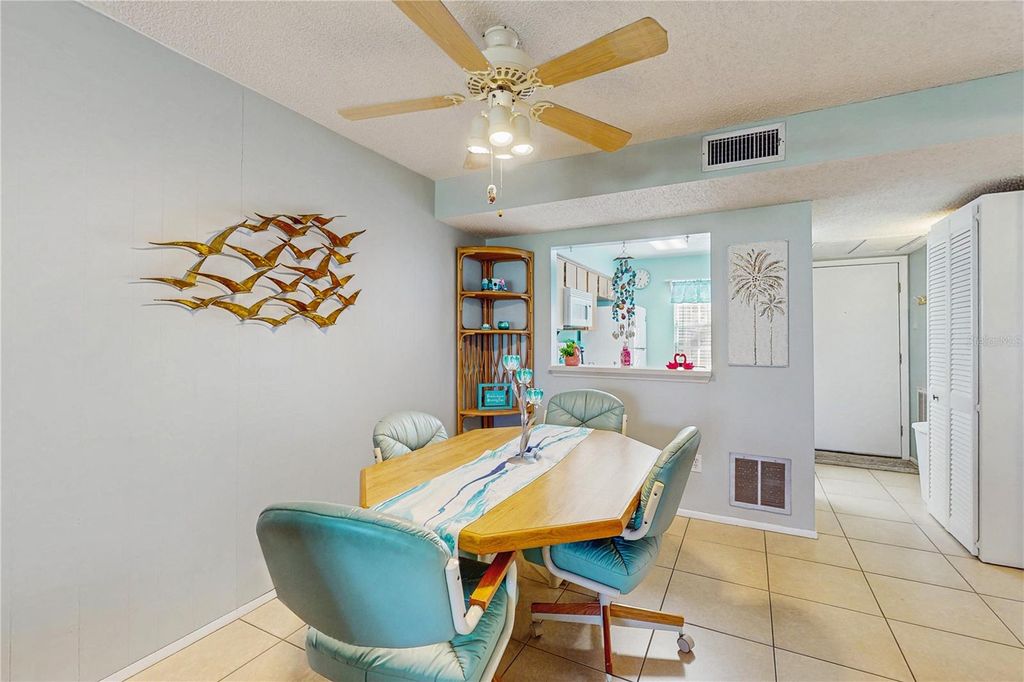 Photo of 11135 Carriage Hill Drive #5, Port Richey, FL 34668 (MLS # TB8434122)