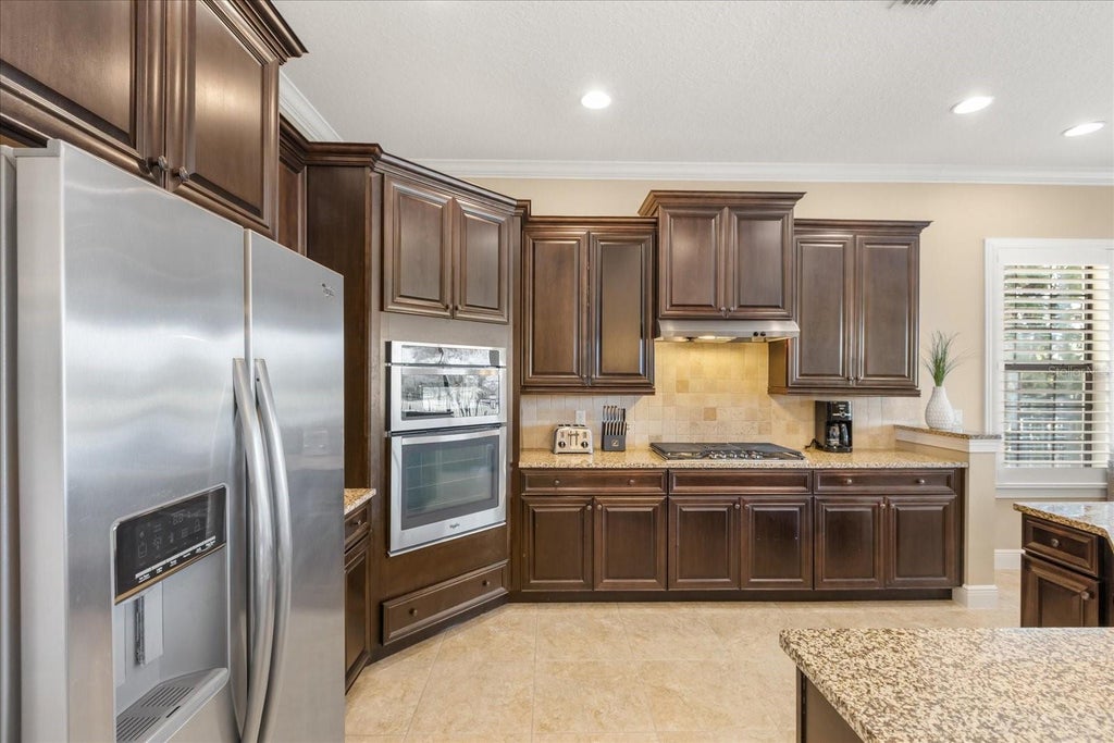 Photo of 989 Desert Mountain Court, Kissimmee, FL 34747 (MLS # O6442654)