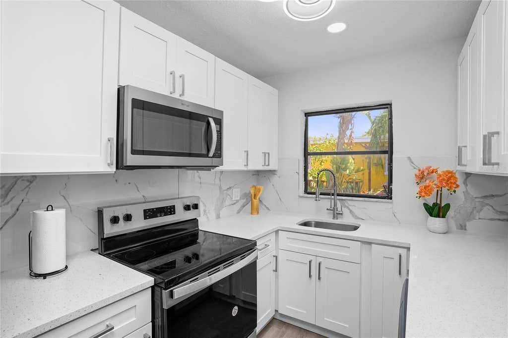 Photo of 630 180th Avenue E, Redington Shores, FL 33708 (MLS # TB8532894)