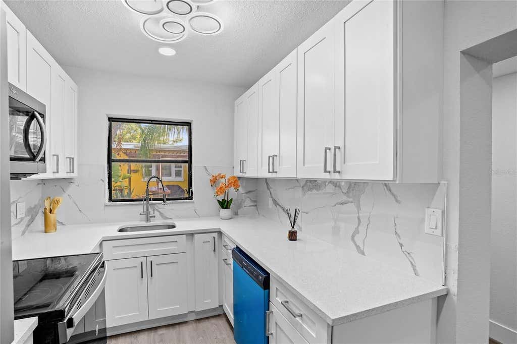 Photo of 630 180th Avenue E, Redington Shores, FL 33708 (MLS # TB8532894)