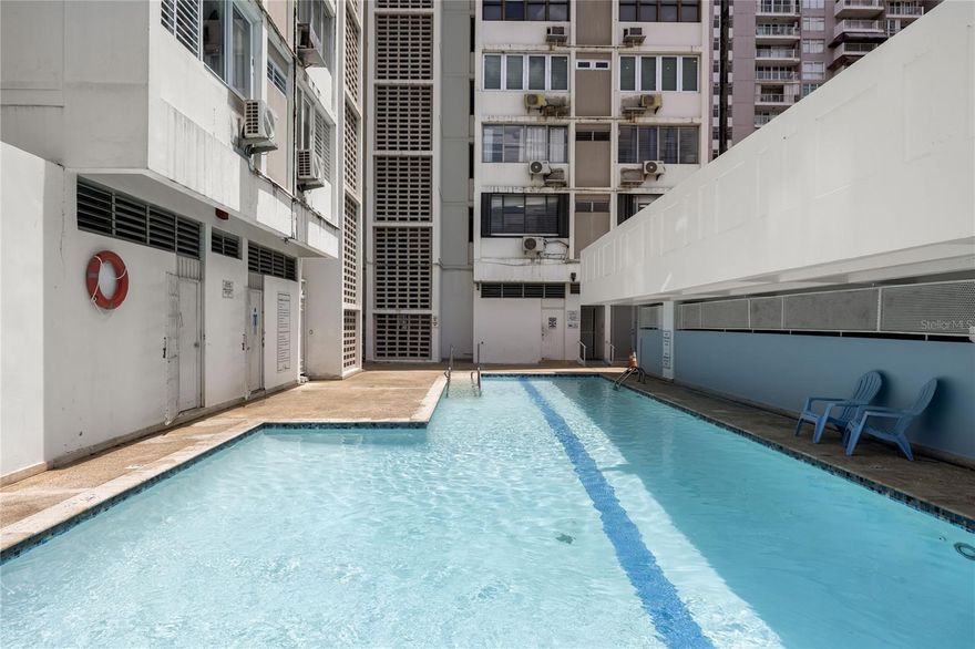 Located in the highly sought-after Racquet Club Condominium, this spacious 2-bedroom, 1-bathroom unit offers the perfect blend of convenience, comfort, and coastal living. Situated just a short walk from the pristine sands of Isla Verde Beach, this condo is an ideal retreat for those looking to enjoy island life.

Inside, the open-concept living and dining areas create a welcoming space for relaxation and entertaining. Large windows allow natural light to flood the space, creating a bright and airy atmosphere. The well-appointed kitchen is ready for all your culinary needs, with plenty of counter space and storage.

The two cozy bedrooms are thoughtfully designed for restful nights, and the modern bathroom provides a refreshing escape after a day at the beach. Whether you're enjoying a morning coffee on your private balcony or strolling along the nearby coastline, this unit offers a lifestyle of relaxation and convenience.

Key Features:

2 bedrooms, 1 bathroom

Walking distance to Isla Verde Beach

Prime location in the Racquet Club Condominium

Open-concept living and dining area

Bright and airy atmosphere with natural light

Great investment opportunity or vacation home

Easy access to restaurants, shops, and local attractions

Enjoy the best of Isla Verde with easy access to everything you need, from world-class dining and shopping to the vibrant beach scene. Whether you're looking for a full-time residence, a vacation home, or an investment property, this condo is a must-see!