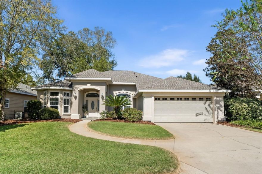 Beautifully maintained Cobblefield home in SW Gainesville! This residence offers 3 bedrooms, 2 bathrooms, and a dedicated office with double door entry and a bay window. Step inside this home into a bright and open floor plan with high ceilings, crown molding, tray ceilings and wood flooring through the main living space and office. You are greeted by the spacious living room with a cozy gas fireplace and built-in area. Adjacent is the light filled formal dining area. 
The kitchen features tall cabinets, crown molding, beveled edge laminate countertops, stainless steel appliances, vent hood, a breakfast bar and charming light filled breakfast area. From here, step out to the screened lanai and enjoy your morning coffee or outdoor dining. 
The spacious primary bedroom suite features two walk-in closets, an en-suite bathroom with dual vanities, a walk-in shower, jetted tub, and private access via French doors to the lanai.  
The laundry room leads to the two car garage and is equipped with a utility sink. The home also was reroofed in 2024.
Cobblefield residents enjoy sidewalks, green space, a community pool, and playground. Ideally located near UF/Shands, Celebration Pointe, Butler Plaza, and I-75, this home combines comfort, convenience, and timeless appeal. Don’t miss your chance to make this Cobblefield gem yours!