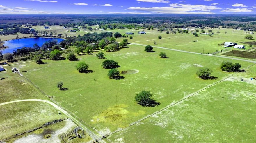 Let FREEDOM ring! NO HOA! Fifteen beautiful, and most importantly, high & dry acres are fully fenced, level, cleared and ready to build! Currently zoned agricultural with 1 dwelling & 1 accessory structure per 10 acres. A gorgeous setting to create a family compound, farm and sustainable lifestyle only few in life have the opportunity to pursue. Build an extravagant ranch or live simply with a manufactured or modular home, all are permitted. A dreamy setting to raise your domestic and farm animals! Currently cows are in charge of the lawn maintenance, so be sure not to let them out! You’ll notice the blue waters of Bay Lake in the distance, the heart and soul of this rural part of Groveland, The City with Natural Charm. Located just 10 miles west of Clermont, this property truly positions you “in the country” with a reasonable commute to every day necessities. Enjoy an active lifestyle with easy access to area state forests, horseback riding trails, and the popular Van Fleet Trail, as well as the scenic West Orange Trail for cycling and running. Historic downtown Clermont features local restaurants, farmers markets, festivals, and lakeside recreation throughout the year! The small downtown area of Groveland has been flourishing as well with delicious Mexican cuisine, Fireworks at Lake David & multiple new annual festivals popping up every year!