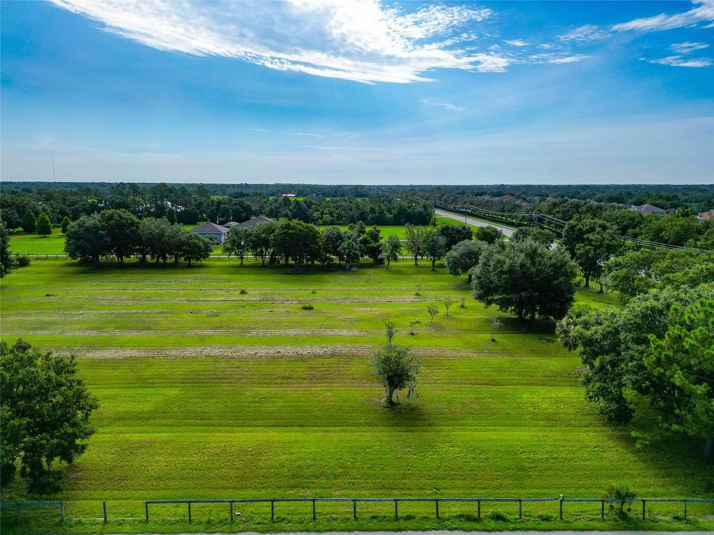 Photo of 13210 Mulholland Road, Parrish, FL 34219 (MLS # A4656869)