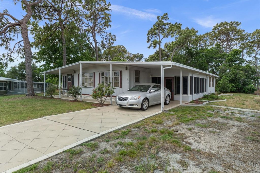 Photo of 7637 Moriah Avenue, Brooksville, FL 34613 (MLS # TB8507954)