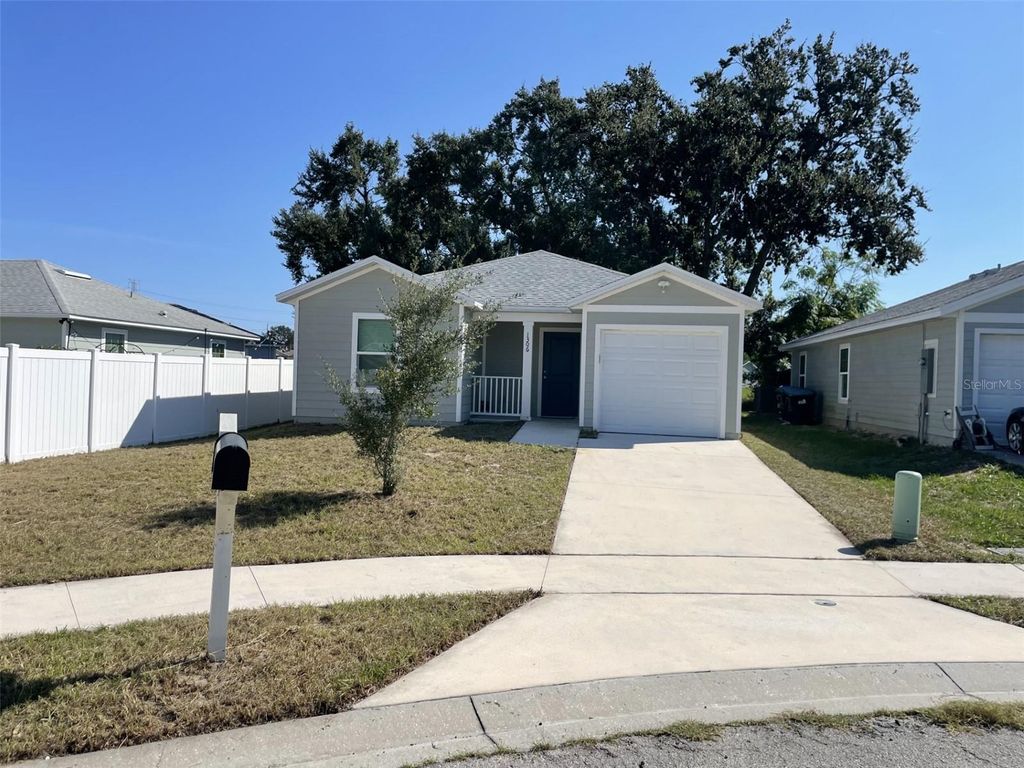 Photo of 1306 Ridge Pointe Dr, Orlando, FL 32808 (MLS # O6355123)