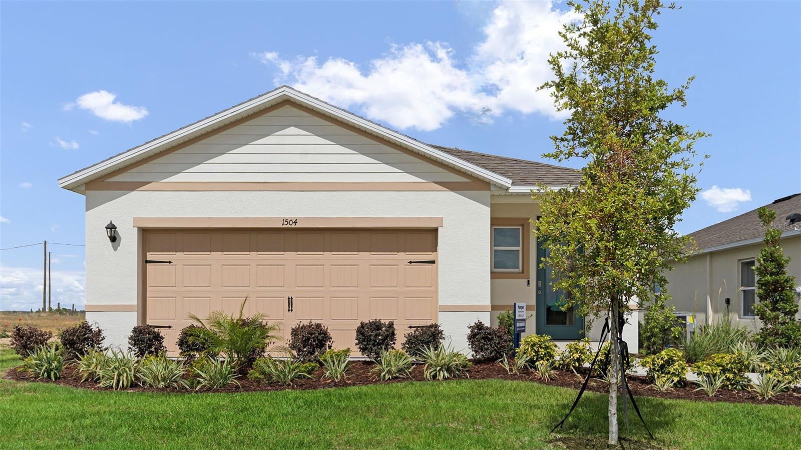 Under Construction. "Step into the Jemison at Magnolia Point, one of our floorplans featuring a seamless blend of design and functionality in Umatilla, Florida.
Inside this 3-bedroom, 2-bathroom home, you’ll find 1,614 square feet of comfortable living. A front porch welcomes to you into the one-story all concrete block construction home. Designed to optimize living space with an open concept kitchen that overlooks the versatile great room and large covered lanai.
The well-appointed kitchen features an island with bar seating, oversized walk-in pantry and sleek stainless-steel appliances.
Bedroom one is located at the rear of the home for privacy and has an ensuite bathroom with double vanity and spacious walk-in closet providing substantial storage space. A second bedroom and bath are located at the front of the home. Just off the kitchen the versatile third bedroom, perfect to meet your needs.
Like all homes in Magnolia Point, the Jemison includes all concrete block and also smart home technology, which allows you to control your home anytime with your smart device while near or away.
Contact us today and find your home.
*Photos are of similar model but not that of the exact house. Pictures, photographs, colors, features, and sizes are for illustration purposes only and will vary from the homes as built. Home and community information including pricing, included features, terms, availability, and amenities are subject to change and prior sale at any time without notice or obligation. Please note that no representations or warranties are made regarding school districts or school assignments; you should conduct your own investigation regarding current and future schools and school boundaries. *