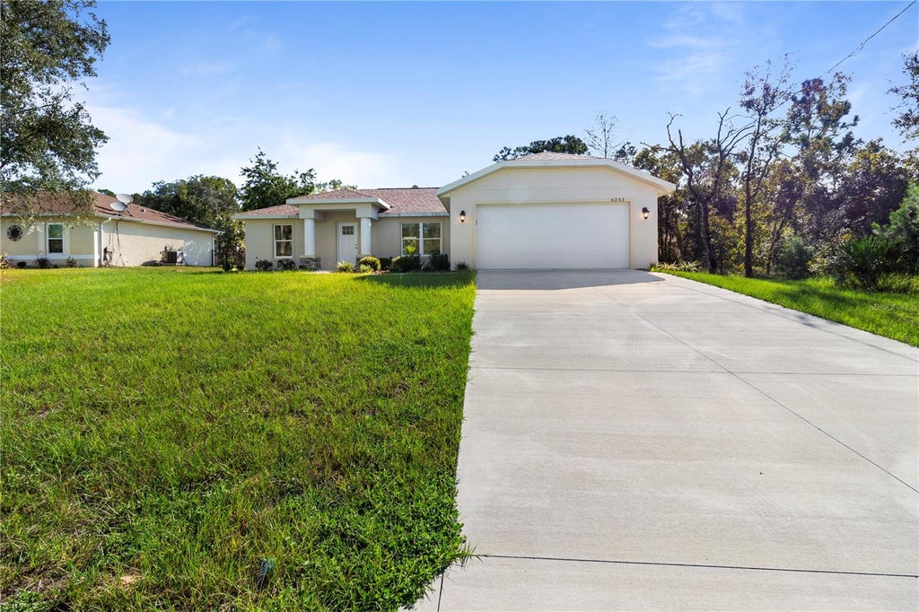 Photo of 6243 N Matheson Divide, Dunnellon, FL 34434 (MLS # OM733464)