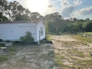 Handyman Special! This spacious lot offers endless potential with a mobile home that needs some TLC—still a great deal compared to buying new. Plenty of room to bring your toys, boats, or RVs. Enjoy the freedom of no HOA and make this property your ownSeller may contribute to closing costs if preferred lender is used.