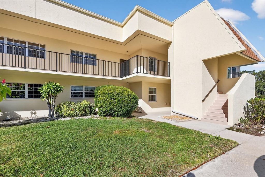 Photo of 7880 Palm Aire Lane #105, Sarasota, FL 34243 (MLS # A4677623)