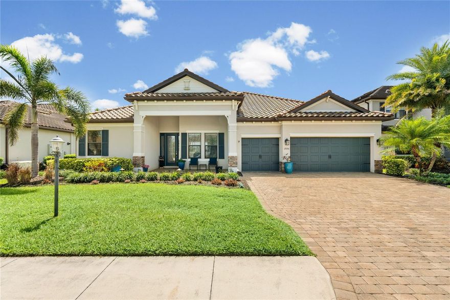 Welcome to this beautifully upgraded Doral Model home in the highly desirable, solar-powered community of Polo Run in Lakewood Ranch. This spacious residence offers an open-concept floor plan that seamlessly blends living, dining, and kitchen areas, perfect for both everyday living and entertaining. Featuring 4 bedrooms and 3 full bathrooms, the layout provides comfort and flexibility for families and guests alike. The home is enhanced with all tile flooring throughout, tinted windows for added efficiency and privacy, and a whole-home water filtration and softener system. Step outside to your private backyard oasis complete with a saltwater pool and spa, ideal for relaxing or hosting gatherings, under lanai lighting, while enjoying peaceful water views. As an added bonus, the home includes a built-in FlightScope Mevo+ golf simulator, bringing the ultimate at-home golf experience right to you! Practice, and play world-class courses, and entertain guests without ever leaving your home. A rare and exciting feature you won’t find in many properties, don’t miss your chance to own this one-of-a-kind setup!  Located in Polo Run, Lakewood Ranch’s premier solar-powered community, residents enjoy resort-style amenities and a vibrant lifestyle just minutes from shopping, dining, and top-rated beaches.
