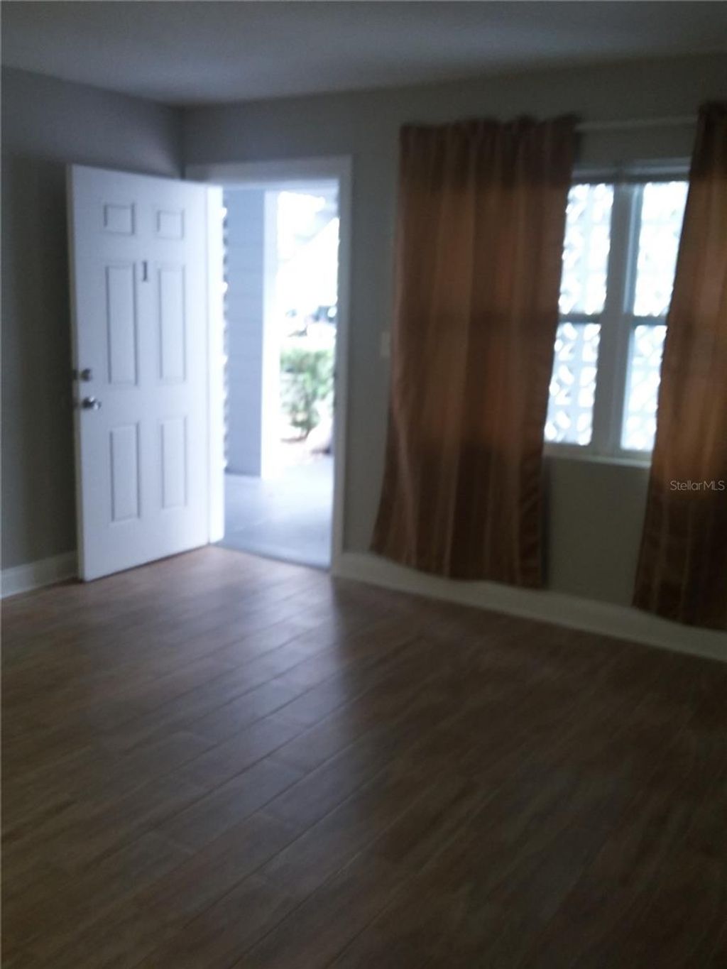 Photo of 1710 S Washington Avenue #01, Titusville, FL 32780 (MLS # O6392051)