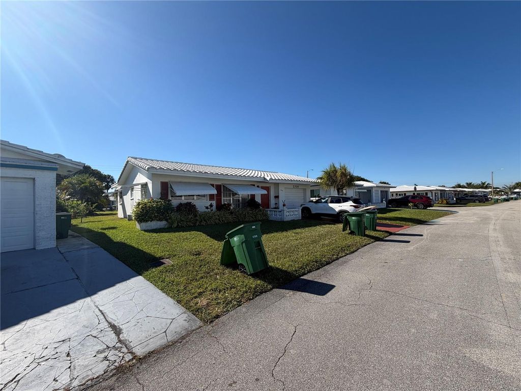 Photo of 5709 NW 84th Avenue, Tamarac, FL 33321 (MLS # TB8471811)